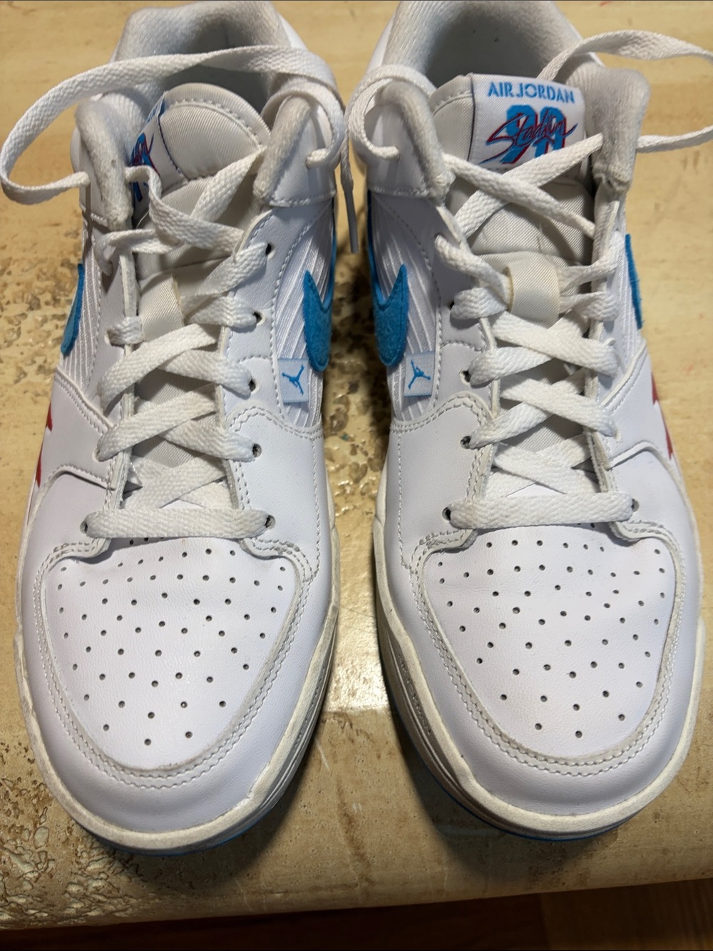 Nike Air Jordan Women’s White Sneakers with Blue Accents